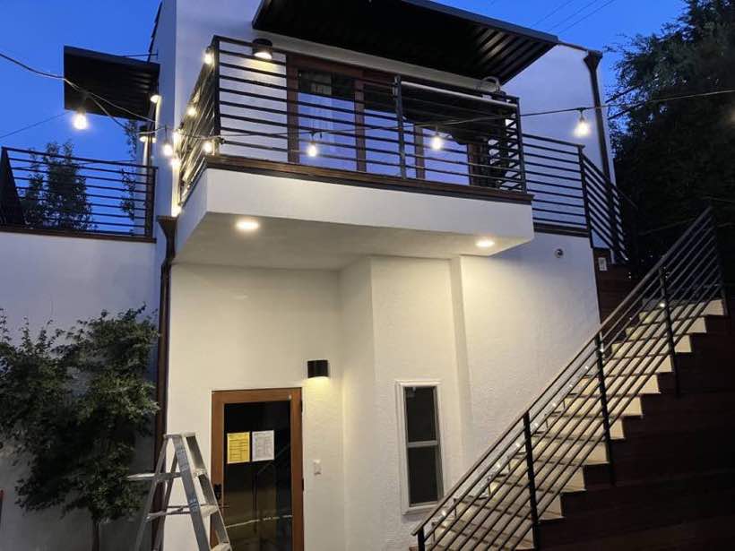 Detached two story ADU at dusk